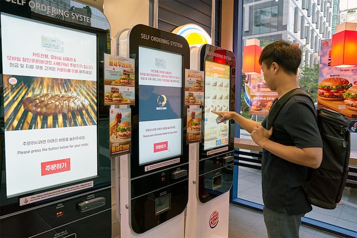 Burger King using touch screen digital menu boards